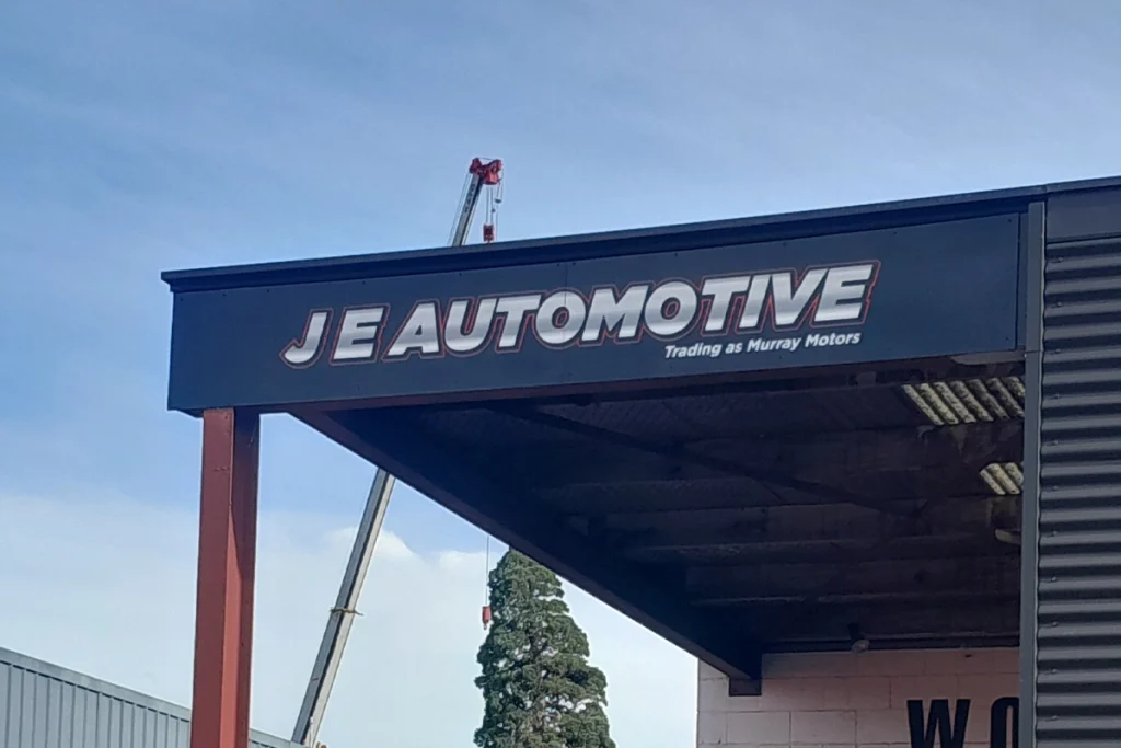 JE Automotive Sign