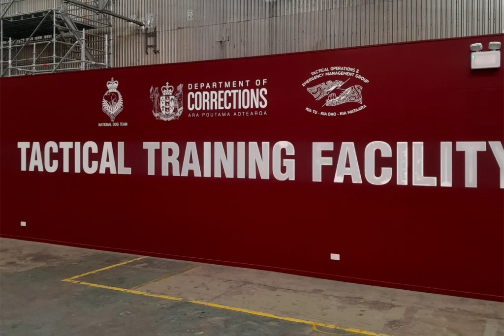 Corrections Wall Sign